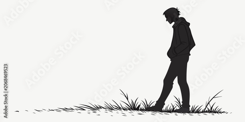 Foto Silhouette of a man walking slowly with his head down in a grassy field expressi