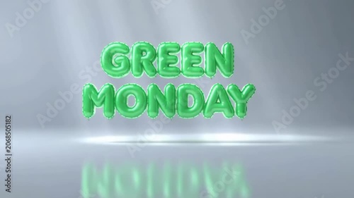 Shiny green monday balloons reflect light in a bright room for celebration