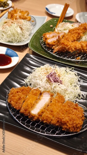 Kurobuta Tonkatsu, deep fried pork serve with vegetables, Japanese food.