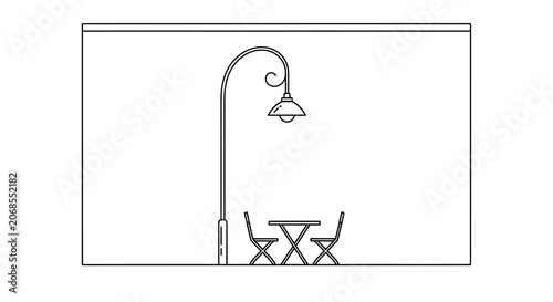 Outdoor Cafe Table and Chairs Under Street Lamp