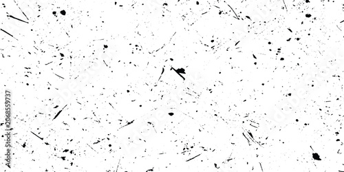 Foto Black and white grunge texture with scratches and splatters on a white backgroun