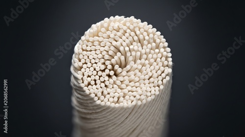 Extreme close-up of white ceramic fiber yarn bundle strands
