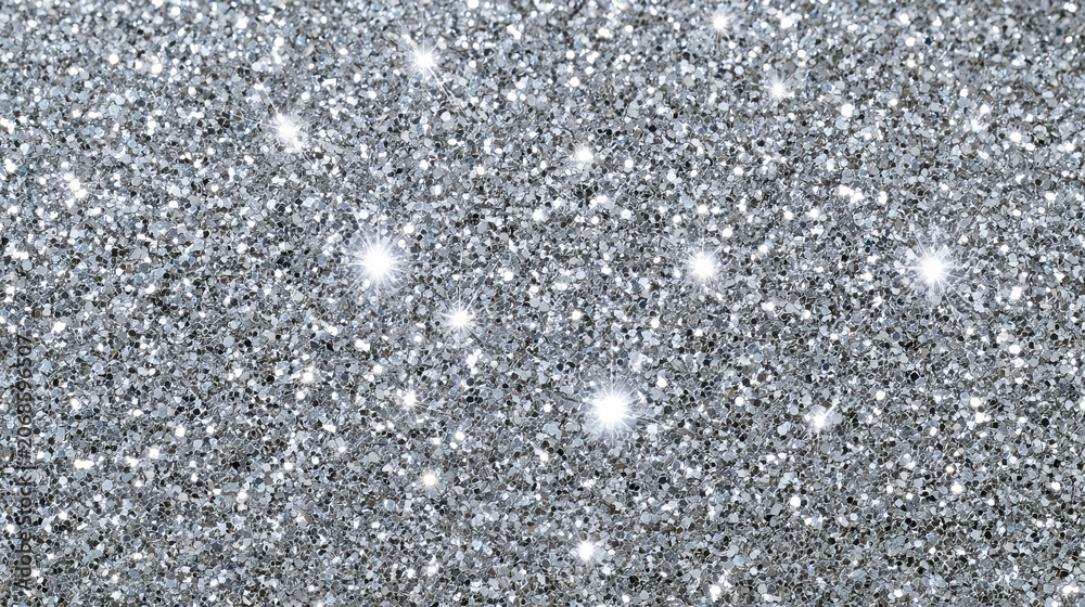 Fototapeta premium Silver glitter texture with sparkling metallic shine and shimmering surface. Festive background for luxury design, holiday card, party invitation, wallpaper and decorative template.