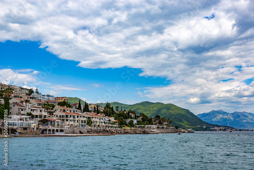 Scenic coastal stretch of Herceg Novi overlooking the expansive blue waters of the breathtaking Bay of Kotor, Montenegro