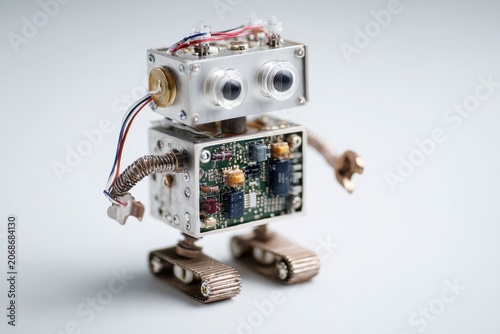 DIY robotics project featuring a small hand-built robot on a clean white backdrop, ideal for STEAM education and maker activities