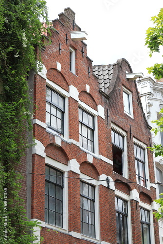 Amsterdam Spuistraat Brick House Facades with Clock and Stepped Gables, Netherlands