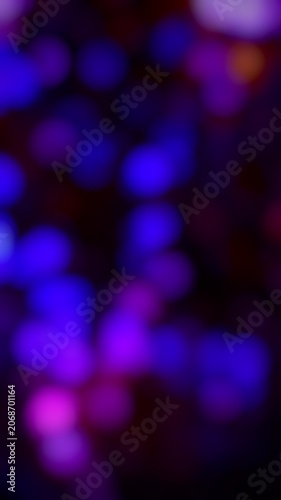 Vivid neon blue and purple abstract lights creating a colorful blurred background suitable for