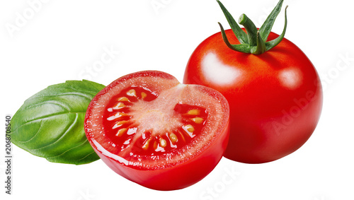 Obraz na plátne Whole ripe tomato and half tomato with basil leaf