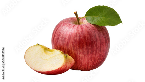 Red apple with leaf and slice showing seeds