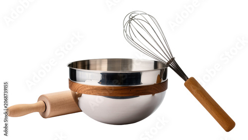 Bild auf Leinwand Stainless steel mixing bowl with wooden accent whisk, and rolling pin