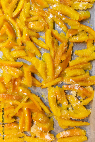 Top view of homemade candied orange peels drying