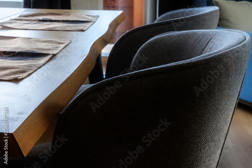 close-up shot elegant grey upholstered chairs