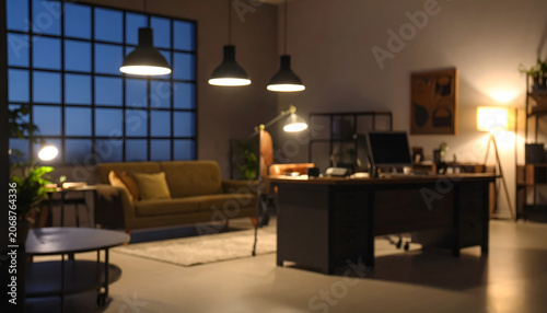 Modern Home Office with Large Window and Cozy Sofa at Dusk.