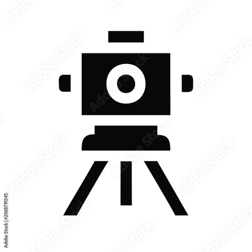 Black telescope on tripod standing ready - A sleek black telescope mounted on a sturdy tripod, poised for observation or photography.