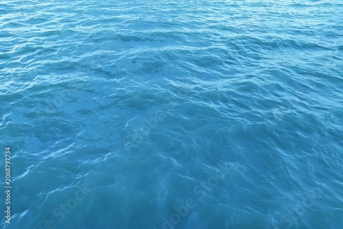 High angle view of beautiful blue sea water surface with gentle ripples and waves