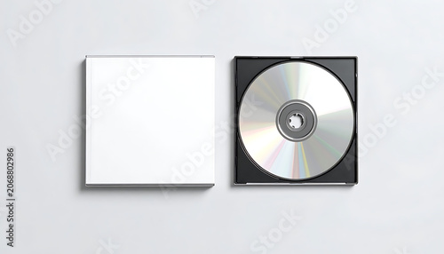 Blank CD case with open cover and inner compact disc, media storage, software distribution