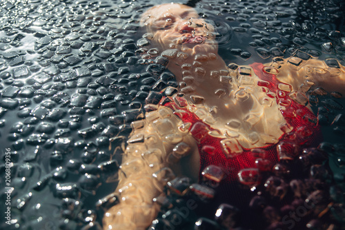 An immersed recovery scene shows a woman in an ice bath for cold therapy.