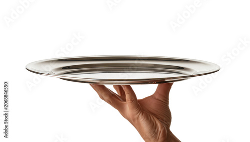 Fotografie Human hand holding a polished silver serving tray, isolated on transparent backg