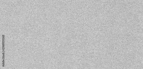 Monochrome noise texture background. Abstract gray pattern with dusty film grain effect. Grunge spotted overlay for graphic design and retro visual style creative project