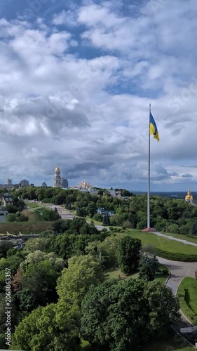 Kyiv skyline with sovereign Ukrainian flag