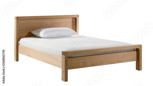 Fotografie Single wooden bed frame with white pillow and mattress