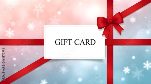 Red Ribbon Tied on Blank Gift Card with Sparkling Background Close Up