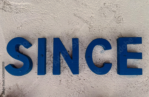 Horizontal straight-on eye level shot of the word 
