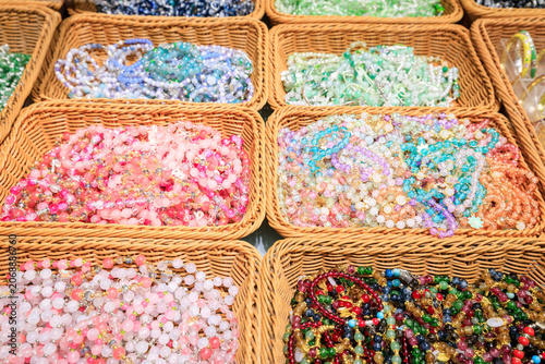 Foto A variety of handmade bracelets from multicolor beads, Beaded bracelet