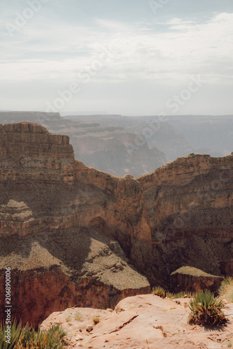 Layered desert canyon landscape at sunrise