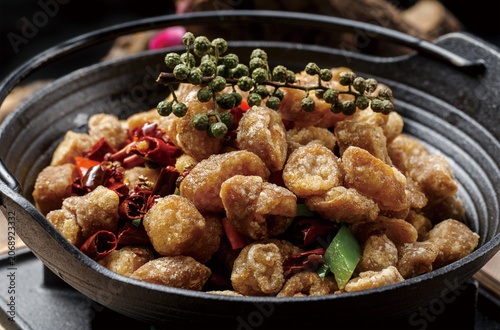 Crispy Hot Pot with Fatty Intestines in a Black Iron Pot