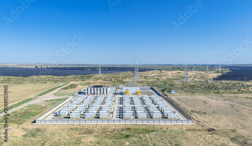 Operational Grid-Scale Battery Energy Storage Station Adjacent to Solar Farm in Arid Region