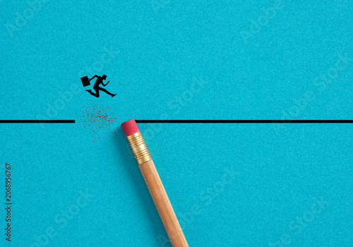 Businessman jumping gap erased by pencil rubber. Concept of overcoming challenges and defeating risks in business.