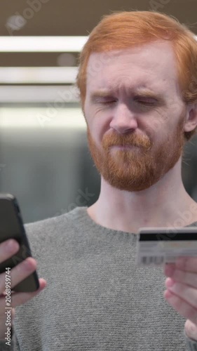 Portrait of Young Man making Online Payment Failure on Smartphone, Vertical Video