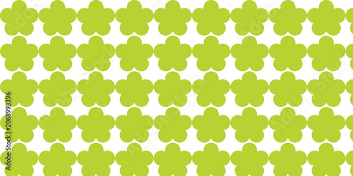 Abstract geometric seamless pattern with simple lime green flower shapes on white background.