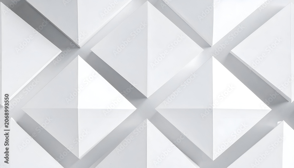 Fototapeta premium Geometric white wall art with a diamond pattern of angled triangular shapes