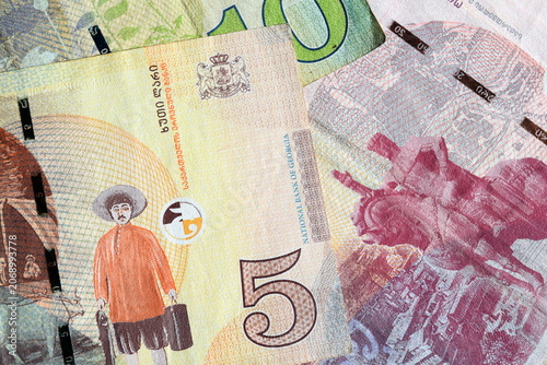 Obraz na płótnie Group of Georgian paper currency gel cash bills background closeup