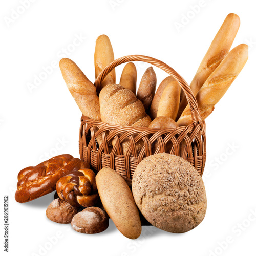 Assorted fresh bread products in a wicker basket isolated on transparent background
