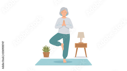 Elderly Woman Practicing Yoga Tree Pose Indoors on a Mat with Plant and Lamp