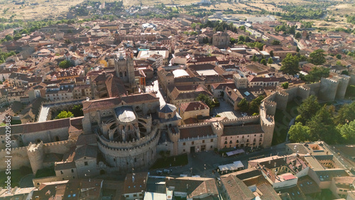 Foto Gothic cathedral of Avila with apse dome towers and adjacent city walls from abo