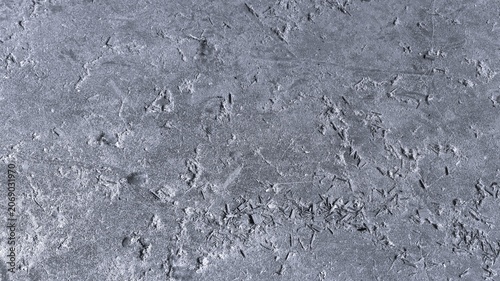 Quadro su tela Monochrome overhead concrete floor with scattered wood shavings, fine grit, soft marks, and weathered construction surface detail