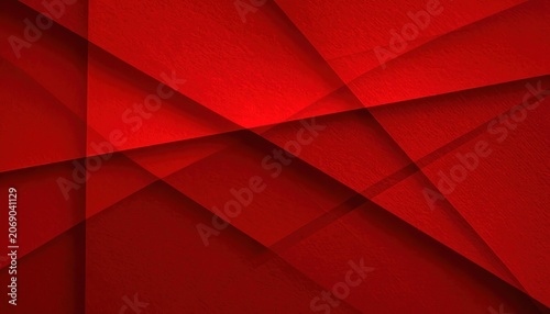 A deep red background with abstract geometric shapes and subtle textures.