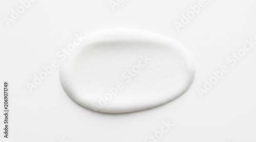 White cosmetic cream swatch isolated on white background