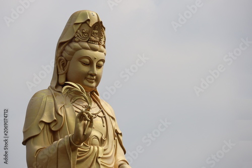 The Huge Guanyin Statue in prayer post at Fo Guang Shan Thaihua Temple Chinese temple, branch temple from Taiwan. Kubon, Khlong Sam Wa BKK. Guanyin is symbol of compassion for humans.