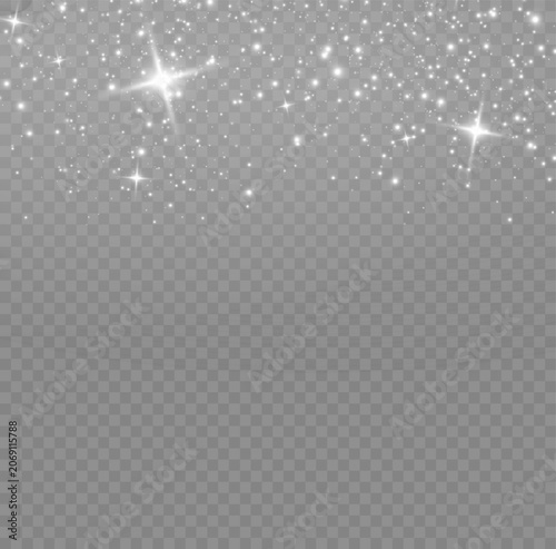 Bright white sparkling dust particles falling down on a transparent background for festive light overlays with particles abstract background celebration christmas glamorous