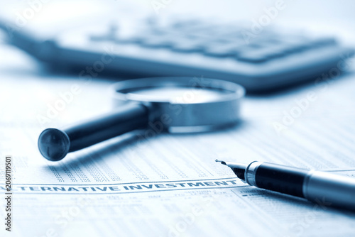 Fountain pen on financial newspaper