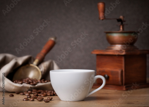 Coffee cup and coffee grinder