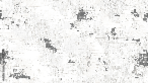 Grungy halftone texture with irregular clusters of black dots on a white background, for a distressed, and weathered visual effect