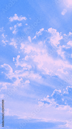 A blue sky with a grainy effect.