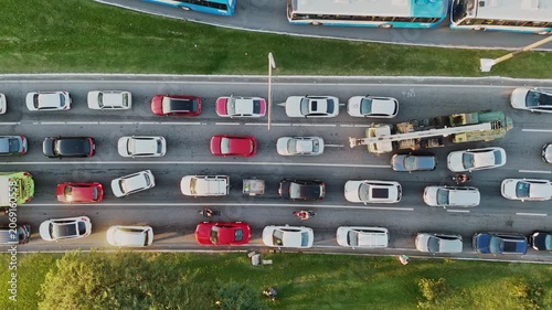 Top Down Aerial View of City Traffic Jam with Multiple Vehicles on Multi-Lane Highway Avenue Street Road