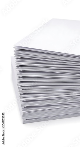 Stack of white paper sheets, a clean and organized office supply.